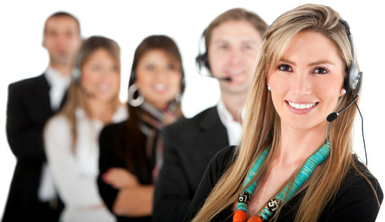 Group of call center workers - isolated over a white background